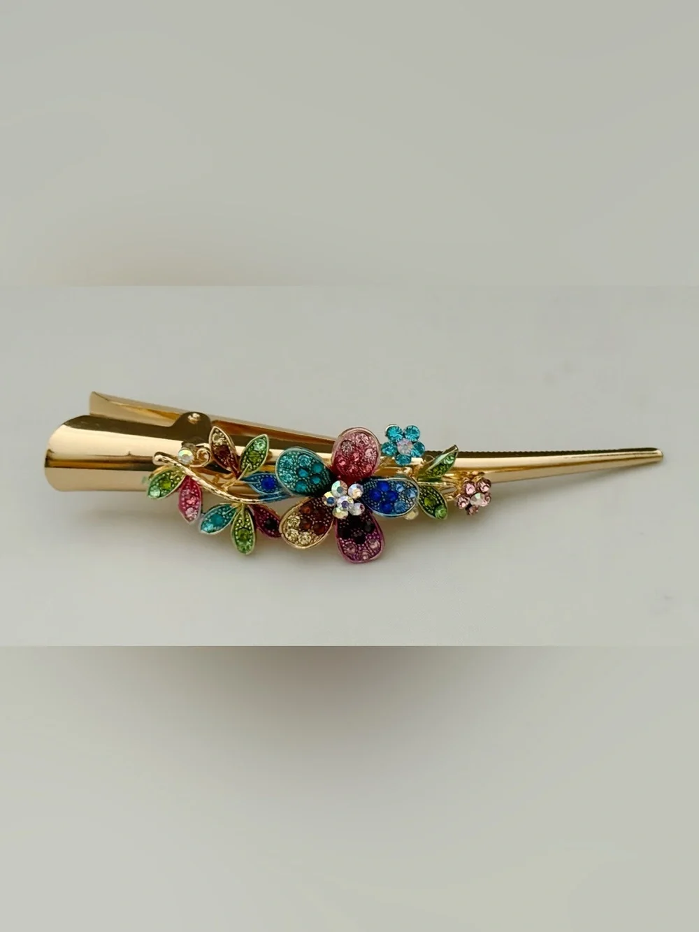 Gold-tone Floral Crystal Alligator Hair Clamp Set with Teal and Multicolor Gems